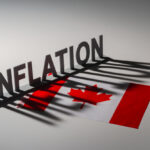 Word INFLATION on Canada flag.
