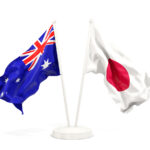 Two waving flags of Australia and japan isolated on white