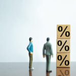 Interest Rate Increase Concept. Businessmen analyzing rising percentages.