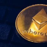 Ethereum cryptocurrency (crypto currency). Silver Ethereum coin with gold Ethereum symbol. ETHEREUM (ETH) cryptocurrency.