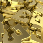 Golden Pound sterling and Coin Stack